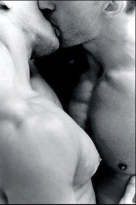 two men kissing in b & w